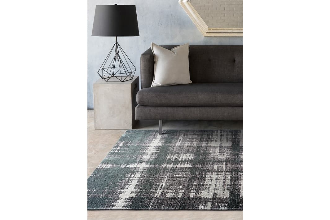 Ковер Megapolis Granit с диваном в интерьере Лофт