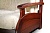 Фото спального места дивана-кровати Лотос с деревянными подлокотниками и спинкой из массива бука