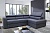 Черный кожаный угловой диван Монако ТС с контрастной строчкой в интерьере